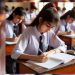 girl student solving paper