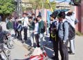 students outside a school